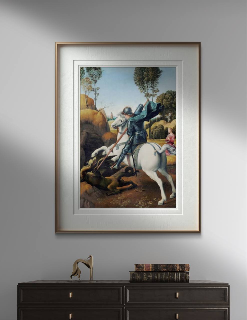 The third image features the "Saint George and the Dragon" painting by Raphael, framed and hung above a dark wooden cabinet. The minimalist frame highlights the dramatic scene without distracting from the artwork's details. The high-quality reproduction ensures that every brushstroke and color is preserved, making it a captivating piece for any decor.