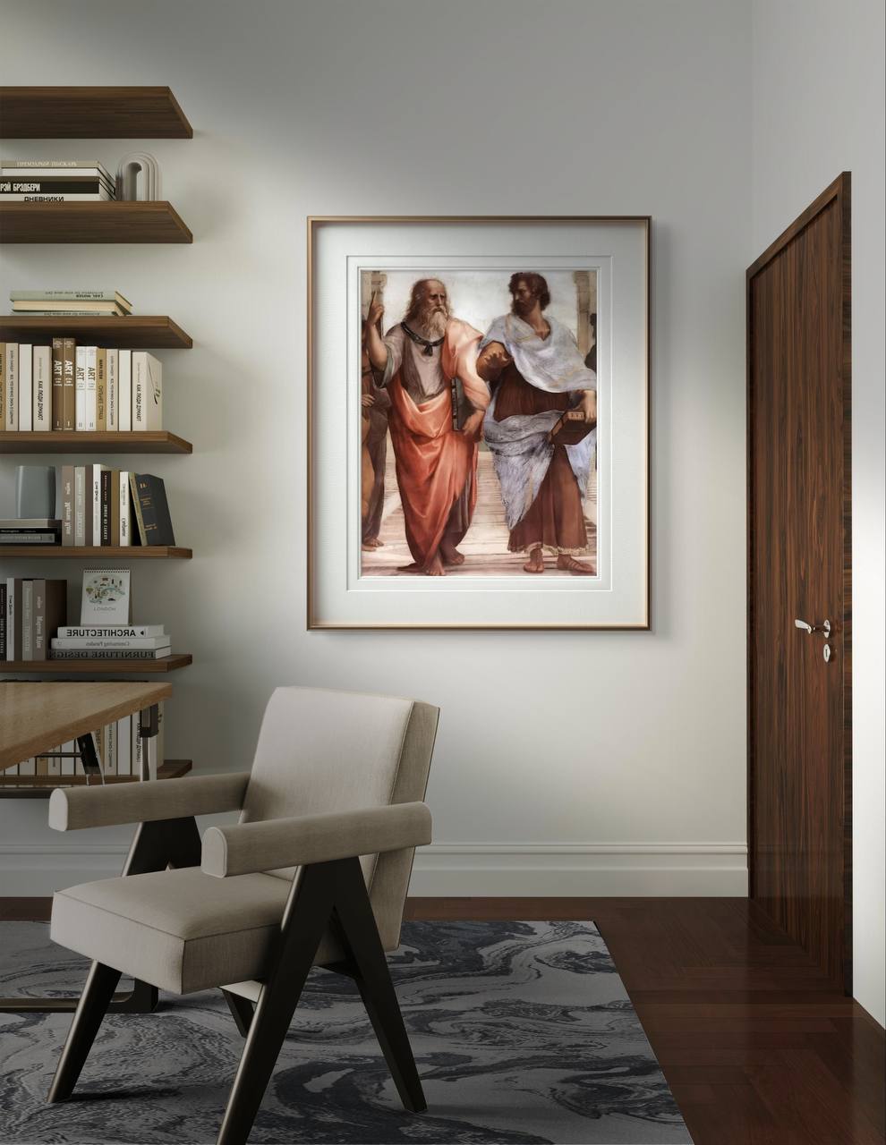 The detail of "The School of Athens" by Raphael, showcasing Plato and Aristotle in the center, is framed and hung in a modern study room. The artwork brings a touch of classical wisdom to the room, which is decorated with contemporary furniture, including a bookshelf and a designer chair.