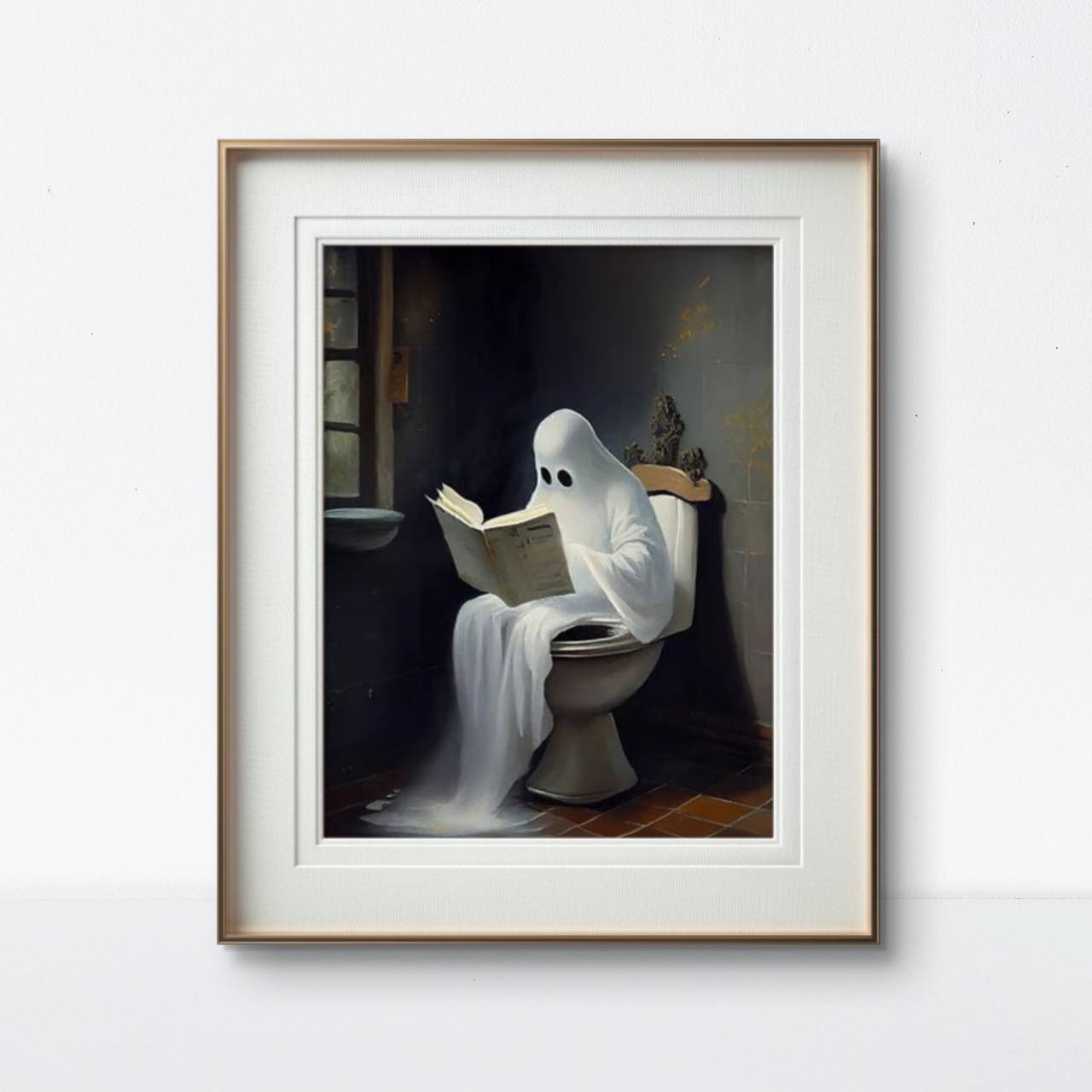 The framed artwork of a ghost sitting on a toilet, reading, is displayed on a white wall. The gold and white frame adds a classic contrast to the quirky, dark-humored art, creating an intriguing blend of styles.