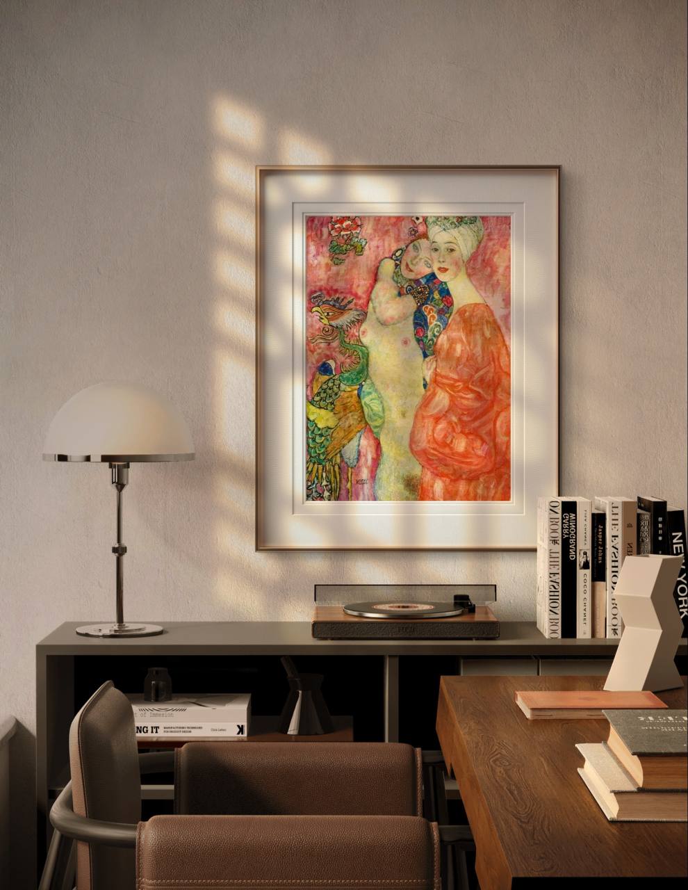 The framed painting from Image 2 is hung on a wall above a modern desk, accompanied by a lamp and books. Natural light filters into the room, creating a warm, cozy atmosphere around the artwork.
