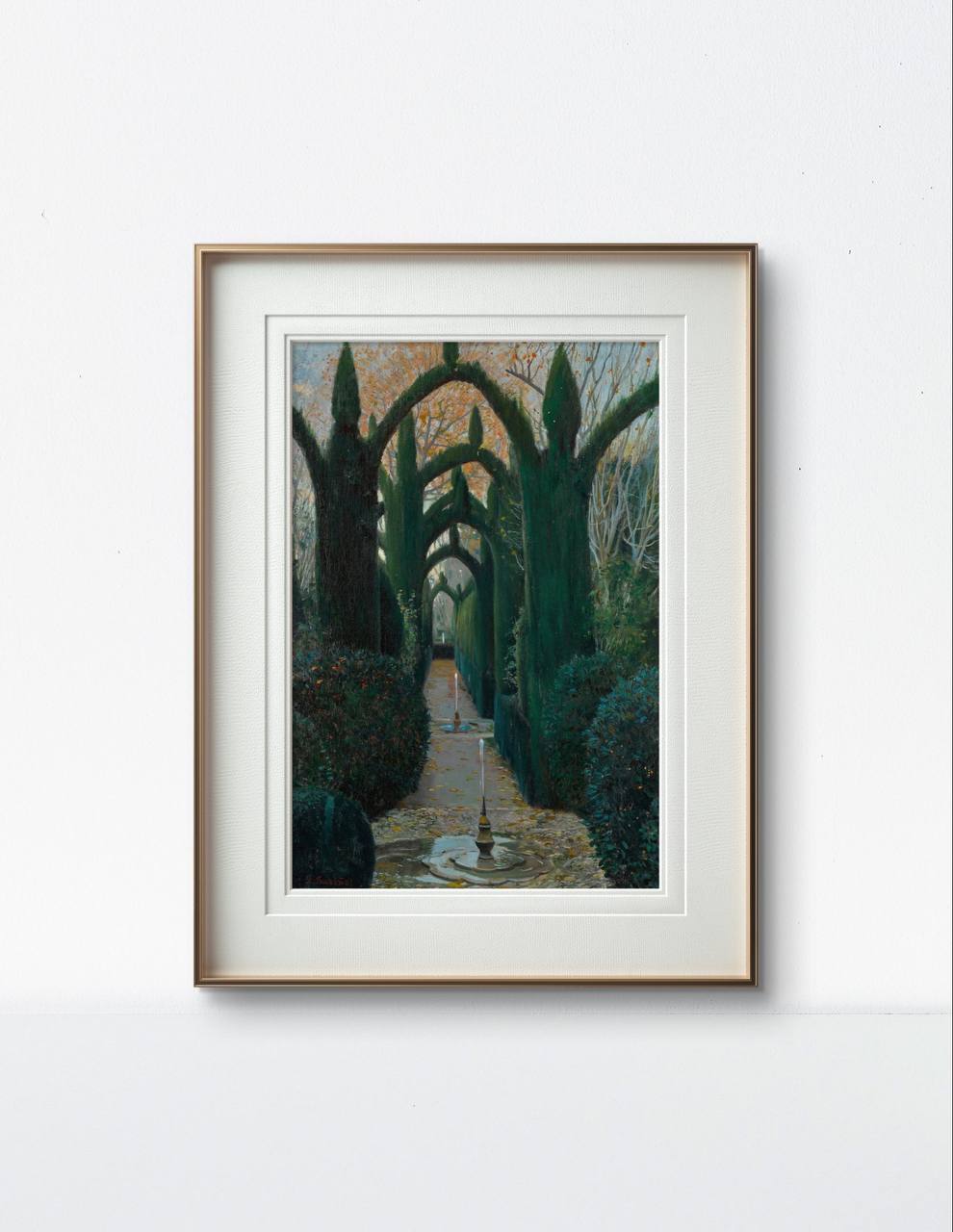 The same garden scene framed in a simple wooden frame with white matting. The dark green and autumnal colors of the painting stand out against a light-colored wall, creating a calming effect.