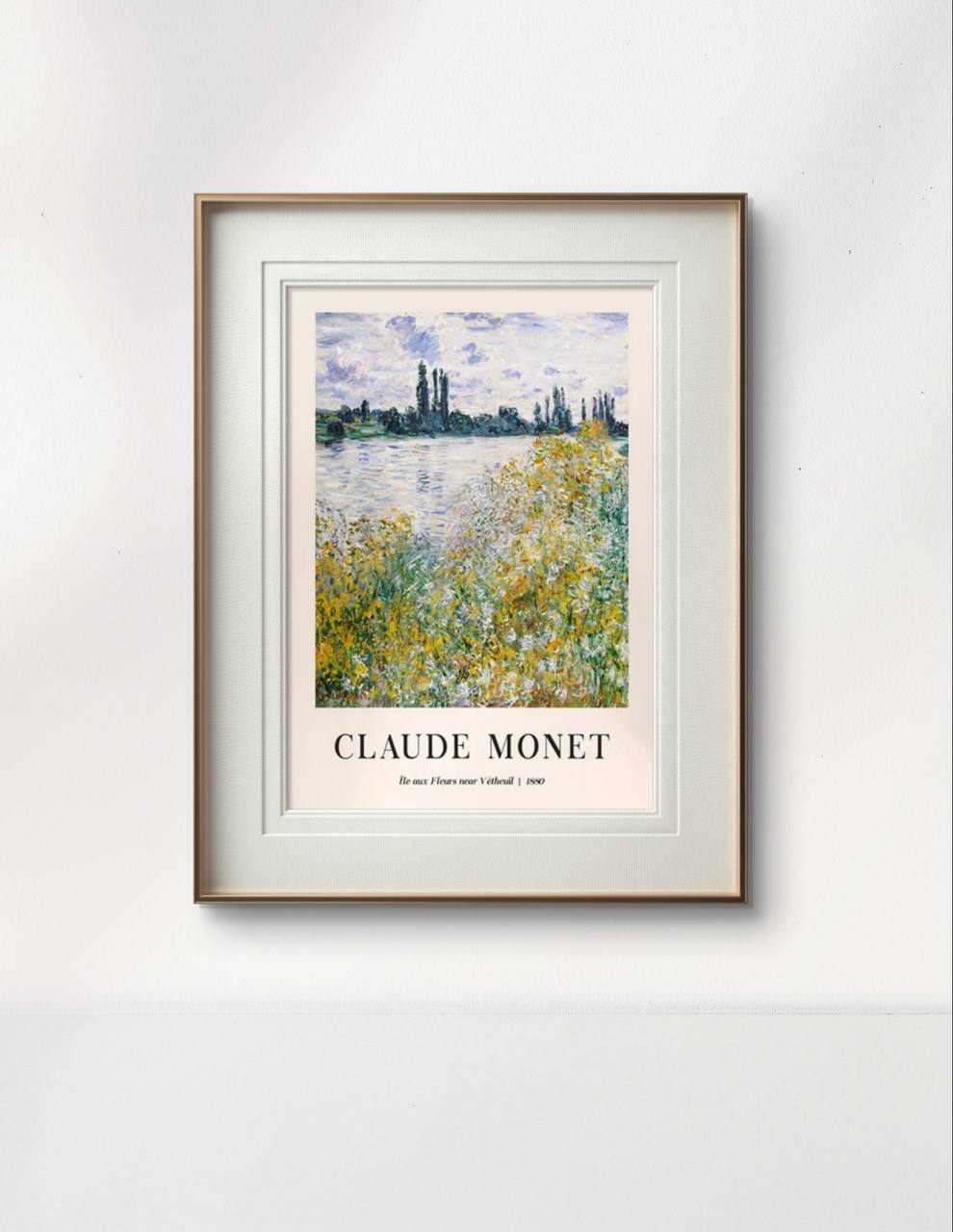 The framed painting of a serene riverside scene brings an air of nature into a modern room, with soft lighting enhancing the calming effect of the yellow and green plants near the water. The room feels both cozy and refined.