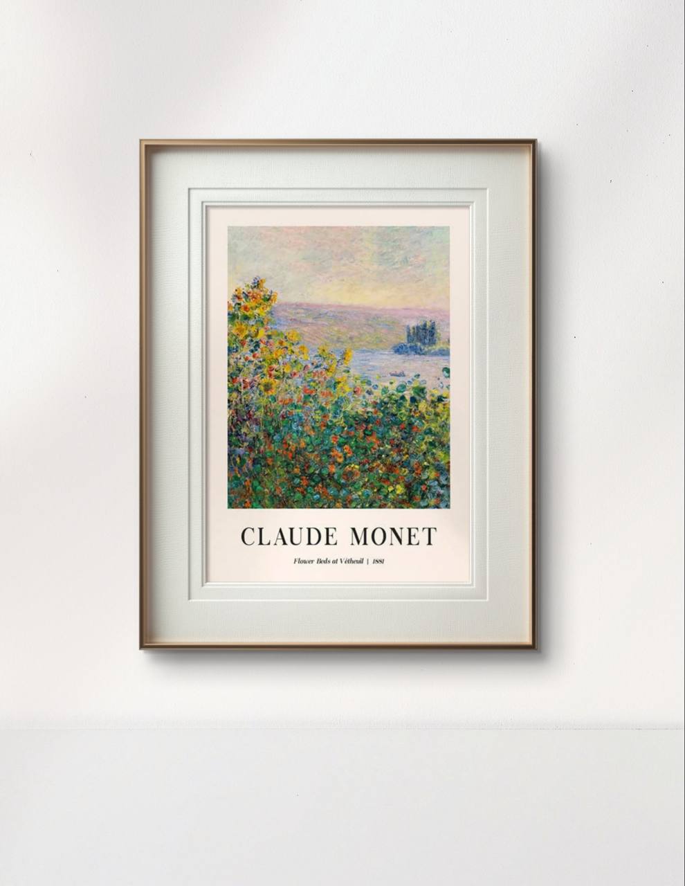 The framed Monet poster "Flower Beds at Vétheuil," displaying vivid flowers with a river in the background, hangs on a minimalist white wall, providing a clean and elegant look.