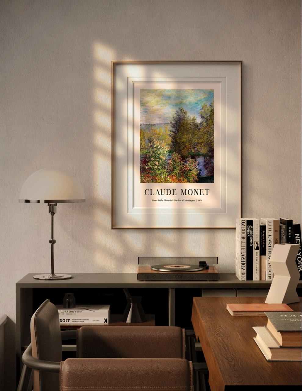 This framed Monet poster, "Roses in the Hoshede's Garden," hangs in a cozy room above a desk, illuminated by soft, natural sunlight, creating a peaceful, artistic atmosphere.