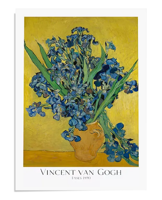 A bouquet of irises in shades of deep blue and violet with long green stems and leaves, arranged in a textured, golden-brown ceramic vase. The flowers appear lively, with swirling brushstrokes adding movement. The background is a rich golden yellow, contrasting with the cool tones of the irises. The artwork is framed with a white border, featuring the text "Vincent van Gogh – Irises 1890" at the bottom.