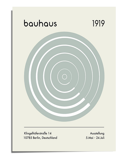 A Bauhaus-style poster featuring a large circular geometric design in soft gray tones, composed of concentric rings with open segments. The text "bauhaus" is positioned in lowercase at the top left, with "1919" on the top right. Additional exhibition details, including location and dates, appear neatly at the bottom. The overall design maintains a clean, modernist aesthetic with a neutral color palette.
