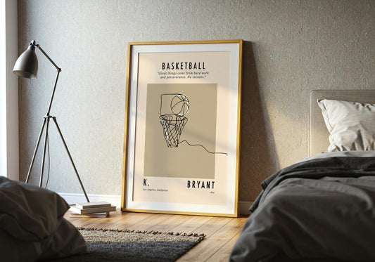 A minimalist line drawing of a basketball going through a hoop, symbolizing a perfect shot. The design is made with a continuous black line on a neutral beige background. Above the hoop is a motivational quote: “Great things come from hard work and perseverance. No excuses.” The text below reads “K. Bryant – Los Angeles, California – 1996”.