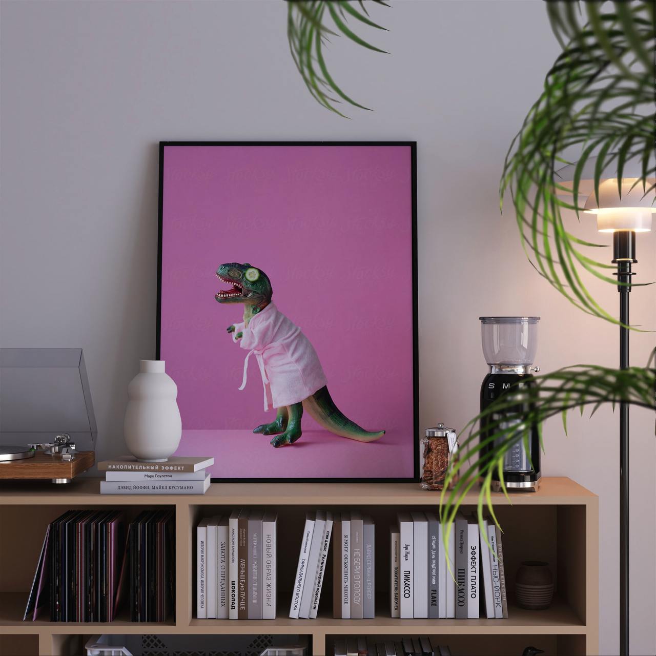 Framed artwork of a dinosaur in a robe on a bookshelf with books and decor items.