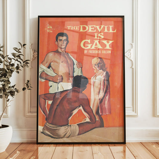 The vintage pulp cover titled "The Devil is Gay" by Frederick Colson features a bold, colorful design. The background is a vibrant orange, and it showcases three figures. A muscular young man stands confidently on the left, partially revealing his chest as he opens his shirt. To his right, a blonde woman in a sheer garment looks on, her expression curious.