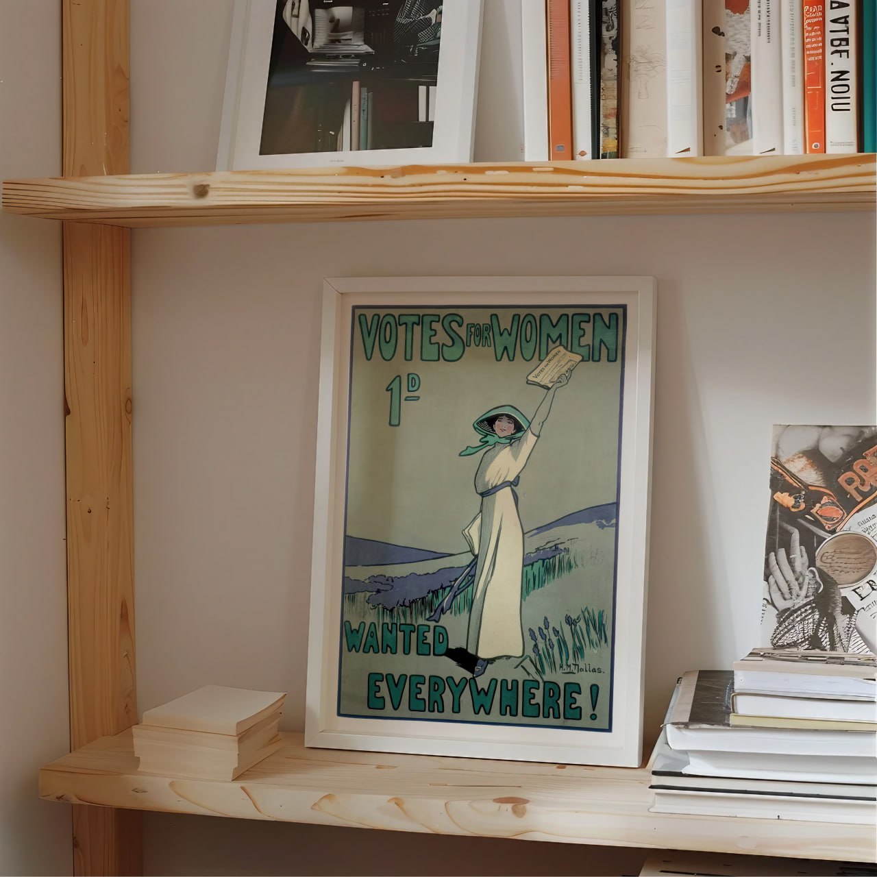 At the top of the poster, the bold text 'VOTES FOR WOMEN' is written in greenish-blue letters. Just below, the price of the suffragist newspaper is indicated: 1d, symbolizing the cost of one penny for the publication