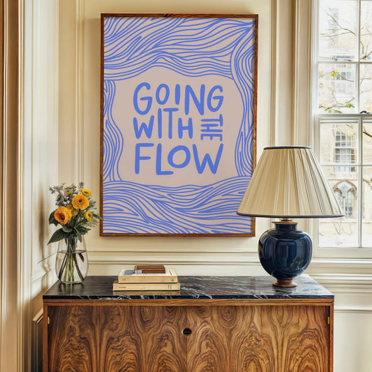The artwork has a minimalist yet visually striking design, featuring the phrase "GOING WITH THE FLOW"