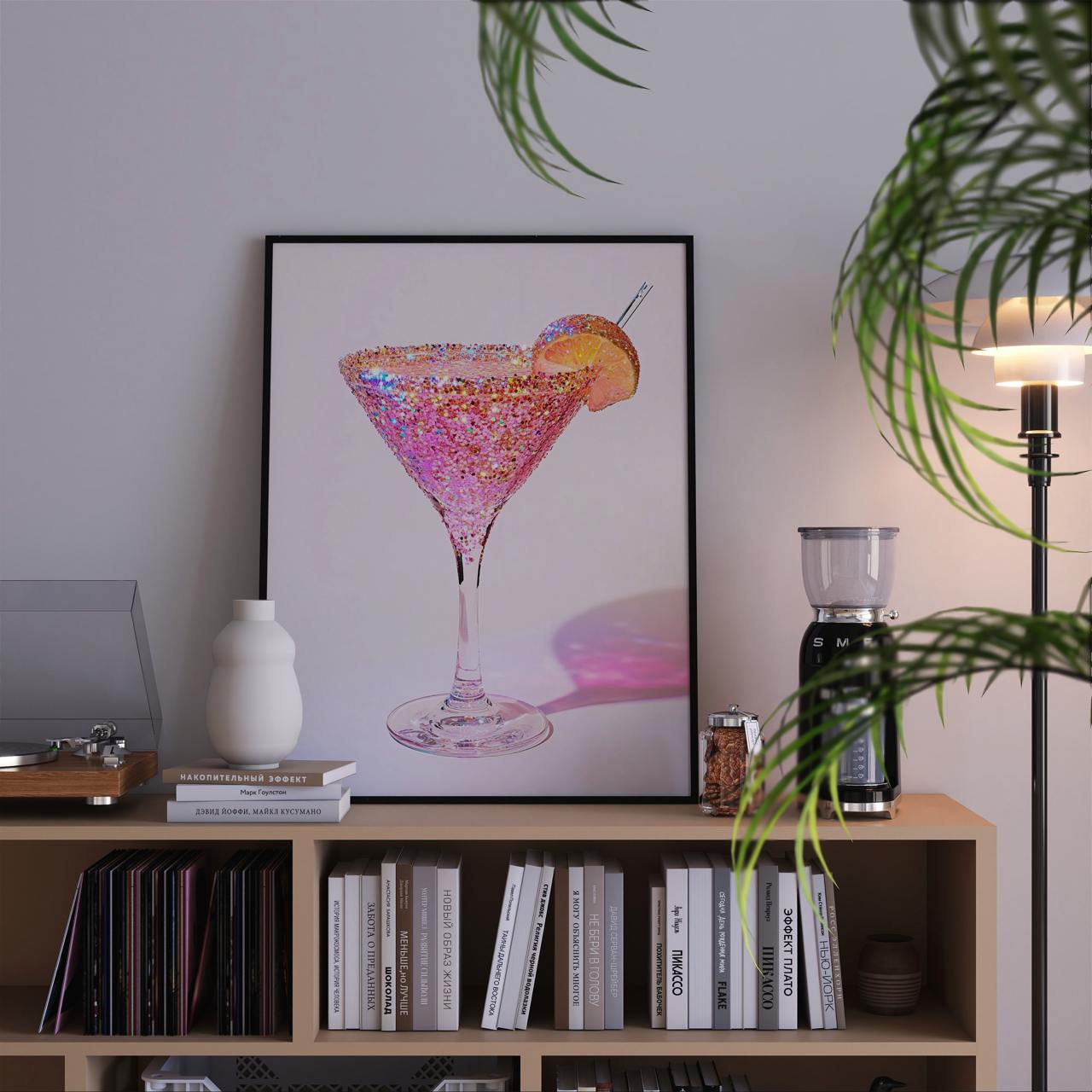 Framed artwork of a cocktail on a bookshelf with books and decor items.