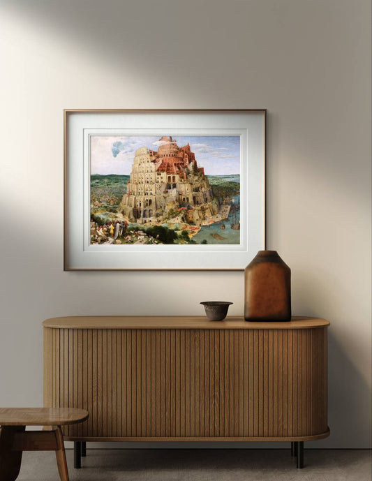 A modern interior space with a wooden console table and a framed poster of "The Tower of Babel" by Pieter Bruegel the Elder. The painting's vibrant colors and intricate details of the tower's construction are beautifully displayed, making it a perfect addition to your home gallery wall or living space. This Renaissance artwork brings a touch of classical art and historical depth to your decor