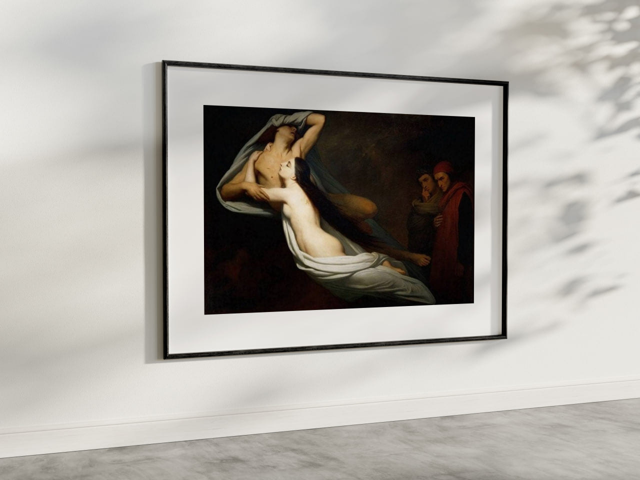 A minimalist interior setting with a light-colored wall and a framed poster of "The Ghosts of Paolo and Francesca" by Ary Scheffer. The painting, a masterpiece from the Romantic period, captures the haunting beauty and emotional depth of the legendary lovers. This wall art is ideal for home decor, adding a sense of historical romance and artistic drama to any room.