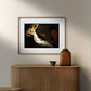 A modern interior space with a wooden console table and a framed poster of "The Ghosts of Paolo and Francesca" by Ary Scheffer. The painting's dark tones and ethereal depiction of the lovers are beautifully displayed, making it a perfect addition to your home gallery wall or living space. This Romantic artwork brings a touch of classical art and emotional depth to your decor.