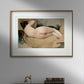 A framed poster print of "Nude Figure Study" by Ramon Casas, elegantly displayed in a modern living area. The artwork features a reclining nude figure with delicate, natural tones and a soft, serene atmosphere. This art reproduction brings a timeless and sophisticated touch to your home decor, making it an excellent choice for art lovers. Keywords: Wall Art, home decor, painting, art reproduction, famous artist, Poster, print, Ramon Casas, Nude Figure Study