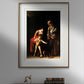 The third image presents the framed Caravaggio poster hanging on a gray wall above a dark wooden cabinet. The frame features a subtle golden edge, adding a touch of elegance to the display. The cabinet below holds antique books and a modern sculpture, creating a blend of classic and contemporary elements. The artwork’s deep shadows and vibrant highlights draw the viewer's eye, making it a focal point in the room.