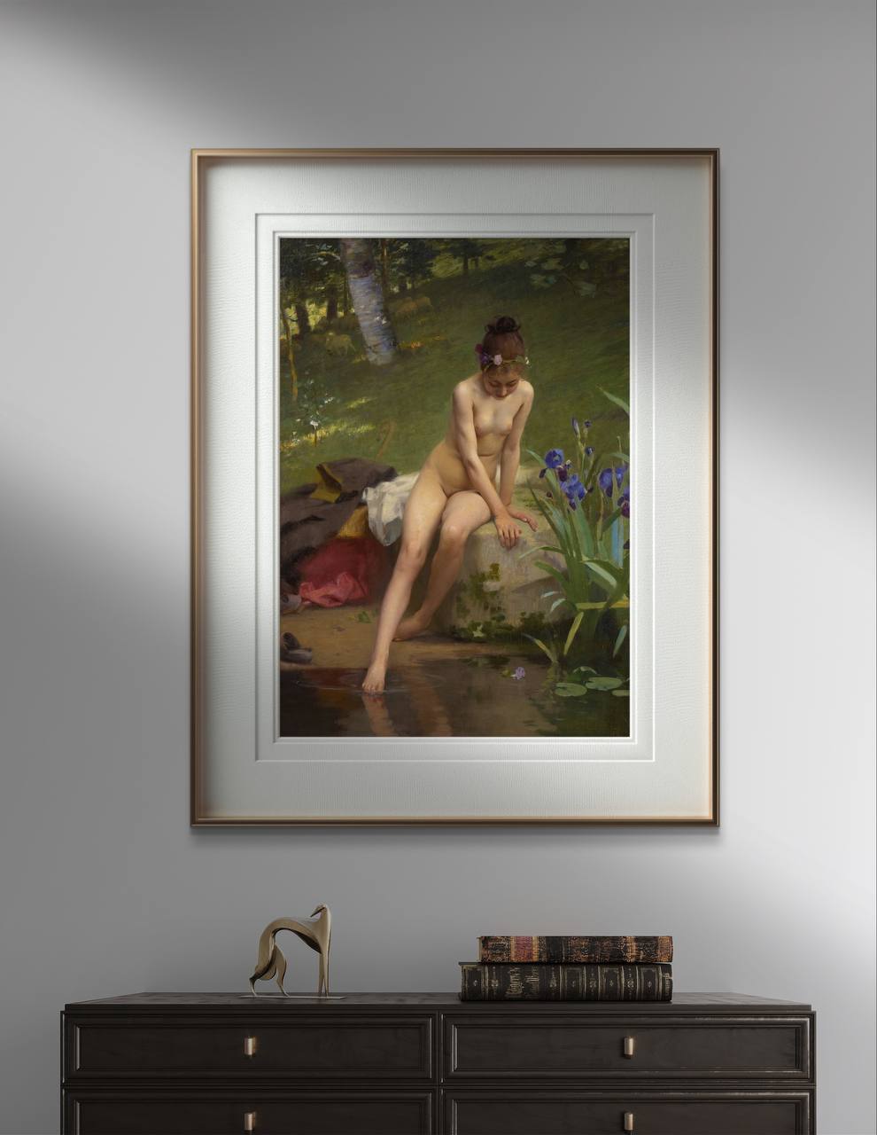 The second image presents the same framed poster on a gray wall. The minimalist golden frame adds a modern touch to the classical art reproduction. Natural light emphasizes the vivid colors and delicate details of Paul Peel's "The Little Shepherdess," creating a peaceful ambiance.