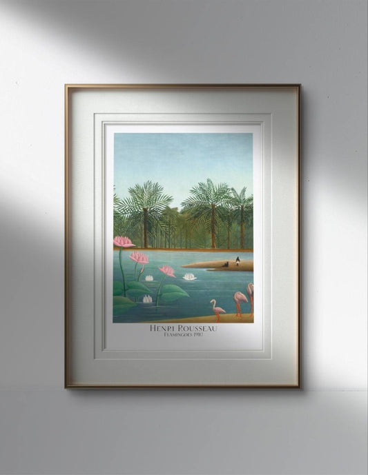 The first image shows a framed poster of Henri Rousseau's "Flamingoes" on a white wall. The framed poster features a simple white border that accentuates the vibrant and serene landscape, showcasing flamingos by a tranquil water body with lush greenery and tall palm trees in the background. The artwork captures the peaceful and exotic ambiance of the scene.