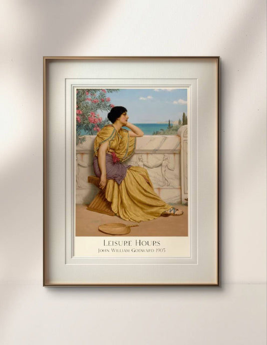 A framed poster of "Leisure Hours" by John William Godward, 1905, featuring a woman seated on a marble bench in a yellow gown and purple shawl. The background showcases a serene Mediterranean landscape. Perfect for a gallery wall or home decor. Keywords: Wall Art, Art Reproduction, Classic Art, Home decor.