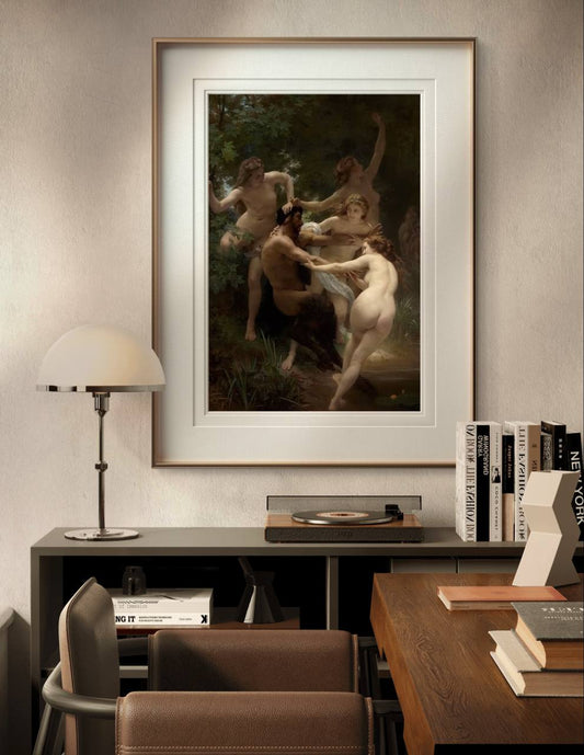 The framed painting of nymphs and a satyr is displayed above a desk in a warm, inviting home office. The surrounding decor includes a modern lamp and a record player, adding a cozy touch.