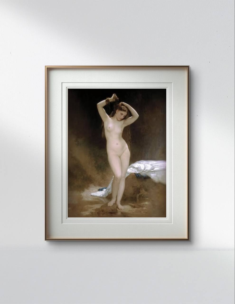 The same classical painting of a nude woman, framed elegantly in white and gold, hangs on a minimalist white wall. The surrounding decor is simple, enhancing the artwork's prominence.
