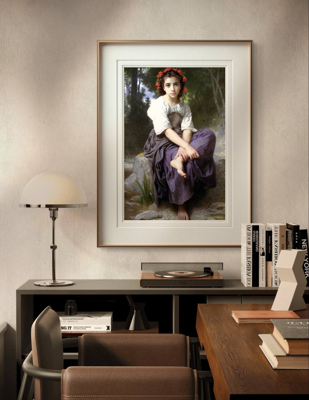 The framed painting of the young girl, captured in a quiet moment by the brook, hangs on a minimalist white wall. The white and gold frame enhances the delicate, natural tones of the artwork.