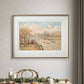 Framed painting of the Louvre from Pont Neuf, hanging in a dining room. The serene view of boats on the Seine and Parisian architecture creates a peaceful, cultured atmosphere in the space