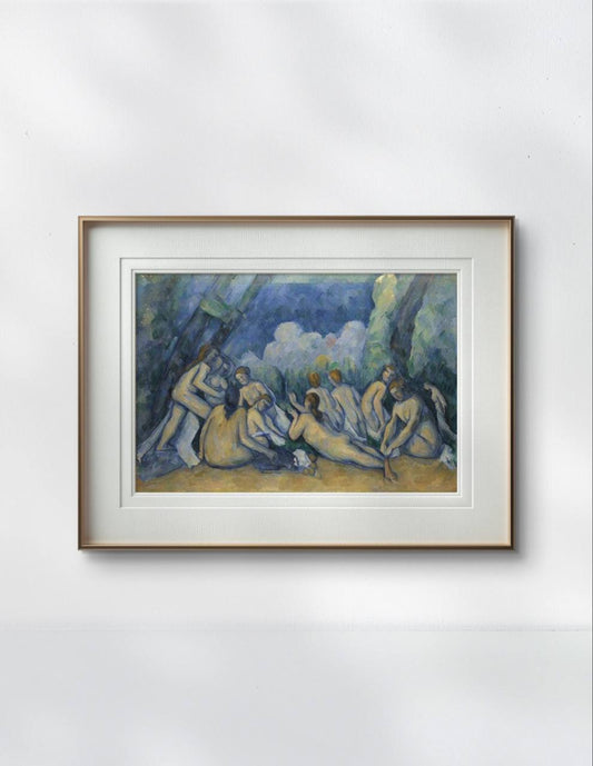 Framed painting of 'Bathers' by Paul Cézanne, with a group of nude figures relaxing in nature. The tranquil and timeless composition enhances the minimalist aesthetic of the room