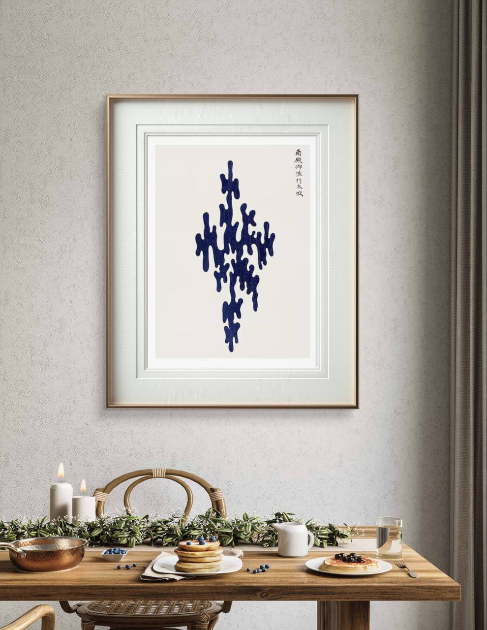 Minimalist abstract painting with a dark blue, fluid shape set against a light backdrop. The framed artwork brings a touch of contemporary design to the dining room, creating a serene atmosphere