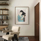 Framed artwork of a Japanese woman carefully combing her long black hair, adding a sense of elegance and tranquility to this cozy home office. The detailed kimono pattern enhances the room’s artistic atmosphere.