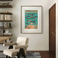 A framed RAF aircraft poster hangs in a minimalist office. The military planes, set against a teal background, bring a nostalgic feel to the contemporary decor.