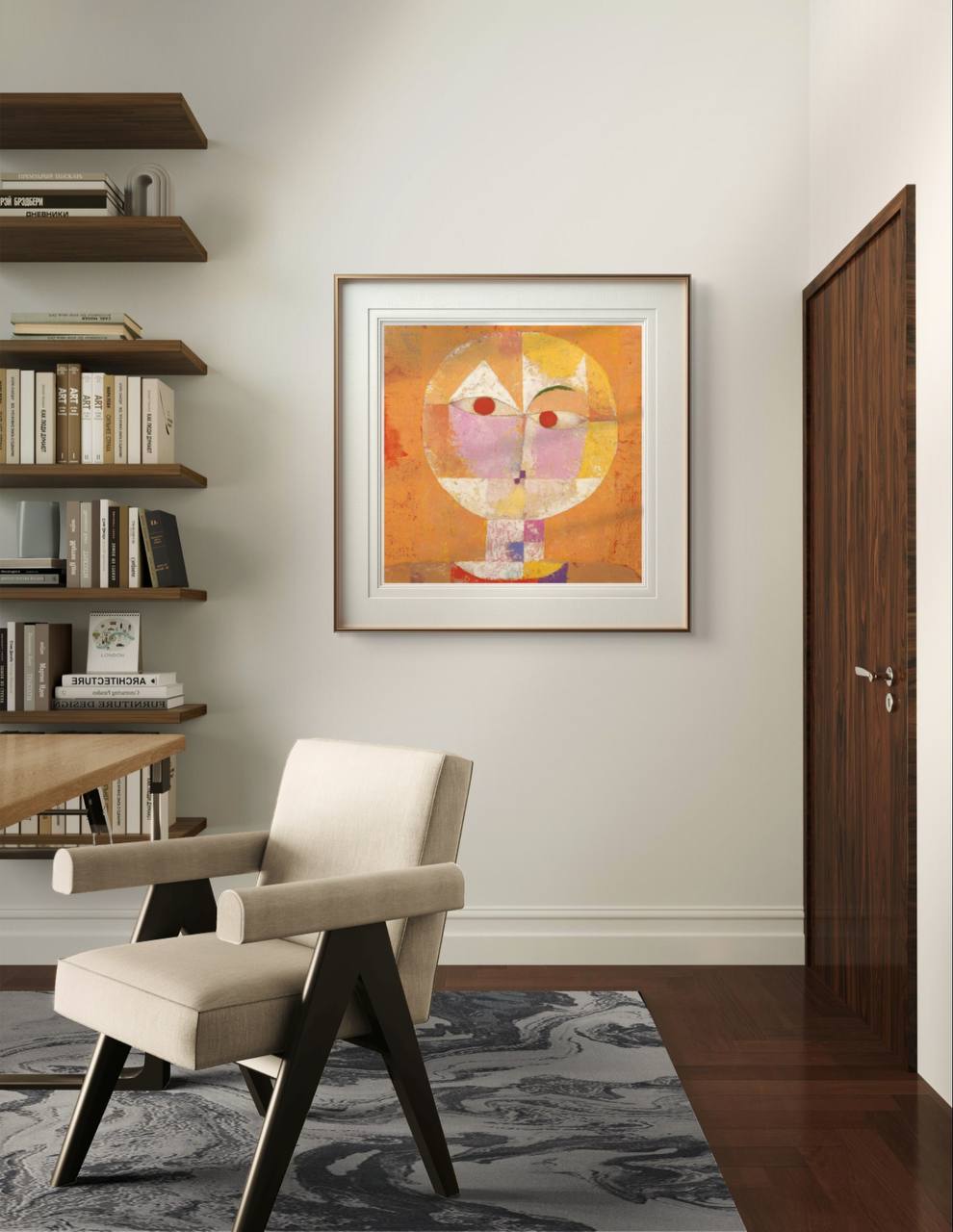 A framed abstract print of Paul Klee's 'Senecio,' featuring a geometric face in warm, earthy tones. The vibrant colors add a lively yet harmonious touch to the modern room decor