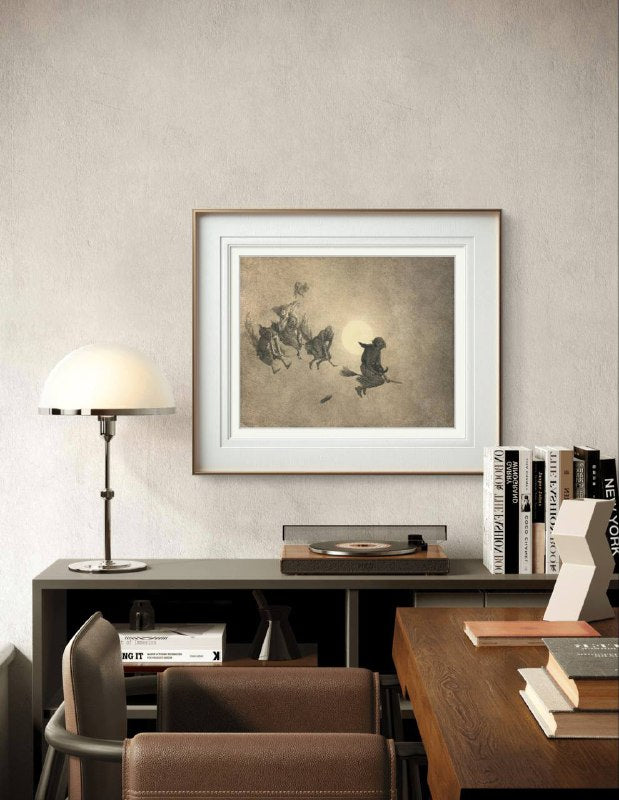 The framed artwork is hung in a modern study, showing the witches soaring across the night sky. The combination of classic style and magical theme adds character and intrigue to the room’s décor.