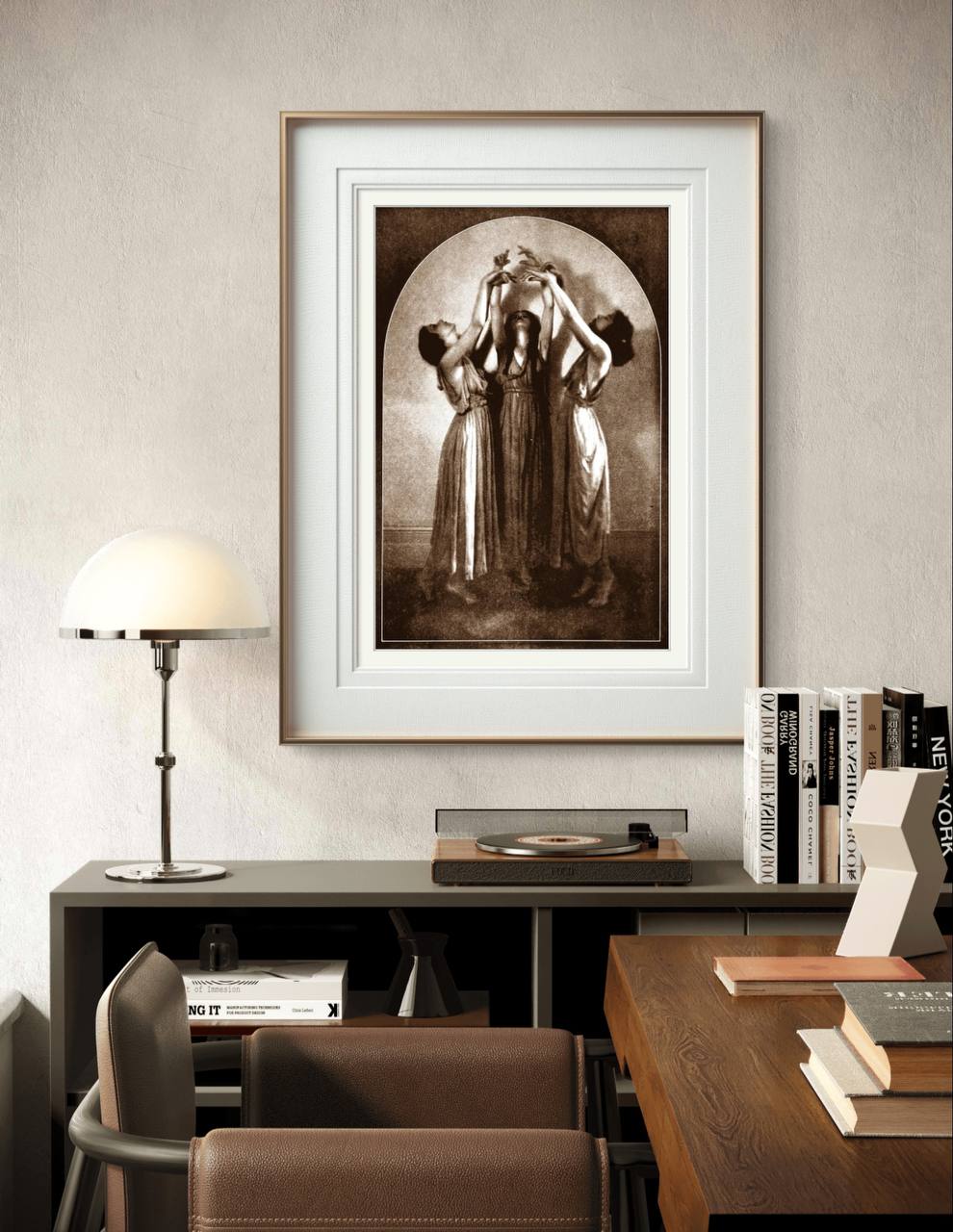 Displayed in a stylish white frame, the mystical image of three women dancing together brings an aura of mystery and timeless beauty to the modern room, blending the old-world charm with contemporary décor.