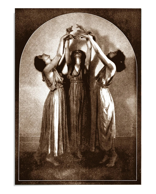 Three women in flowing dresses stand in a circle, their arms raised and hands intertwined, as if engaged in a mystical ritual or dance. The sepia tones and soft lighting evoke an air of enchantment and mystery.
