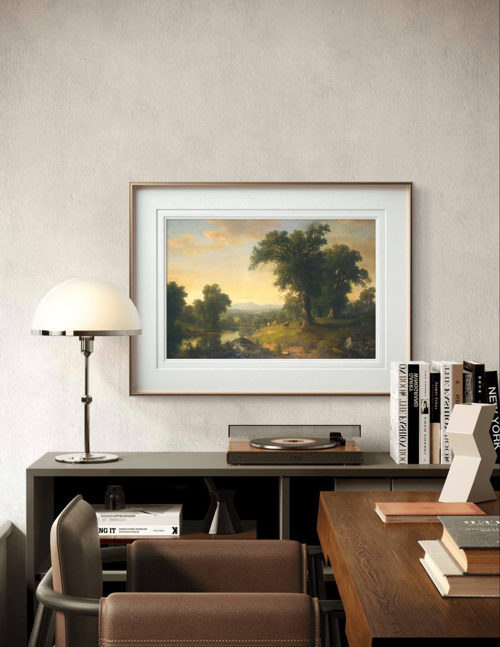 A serene vintage landscape painting featuring lush trees, a winding river, and distant mountains bathed in golden light. Grazing cows dot the peaceful countryside, evoking tranquility and the beauty of nature.
