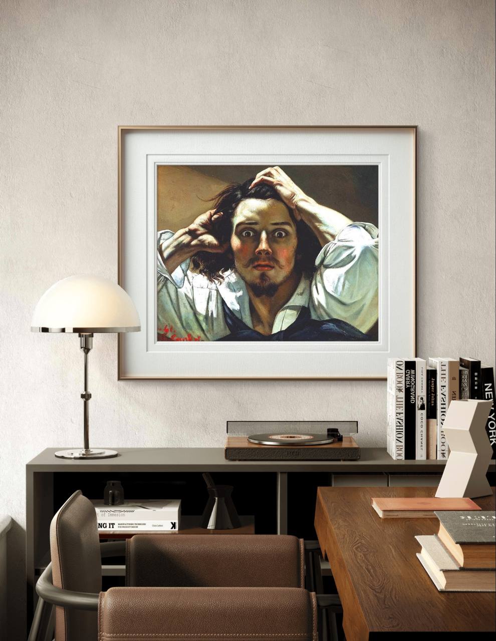 A framed painting of a distressed man, displayed in a modern room above a desk with a lamp, books, and a record player. The minimalist decor contrasts with the intense emotion captured in the artwork.