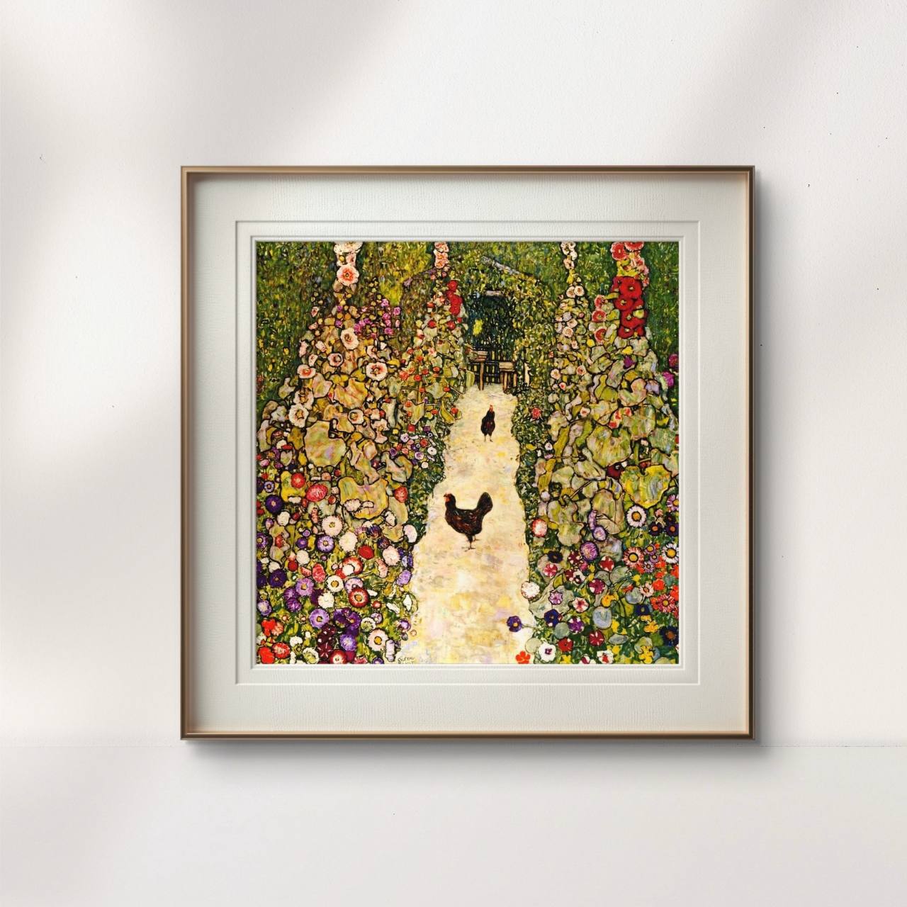 A framed painting of a flower-filled garden path with chickens, hung on a light wall. The rich greens and colorful blooms in the artwork bring a sense of nature and tranquility to the room’s decor