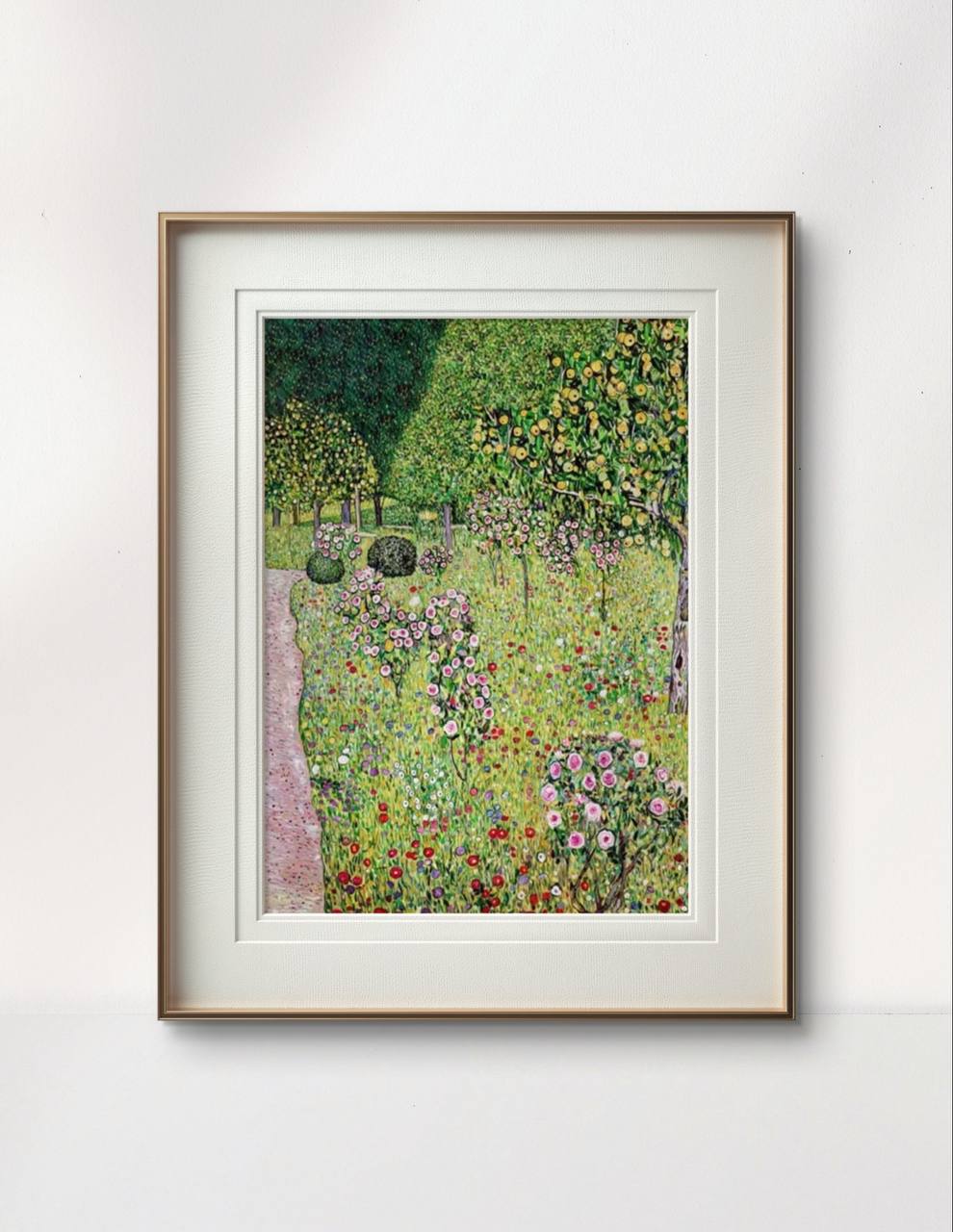 A framed painting of a rose-filled garden surrounded by fruit trees, displayed against a light wall. The intricate details of the flowers and foliage add a refreshing and vibrant touch to the room's decor.