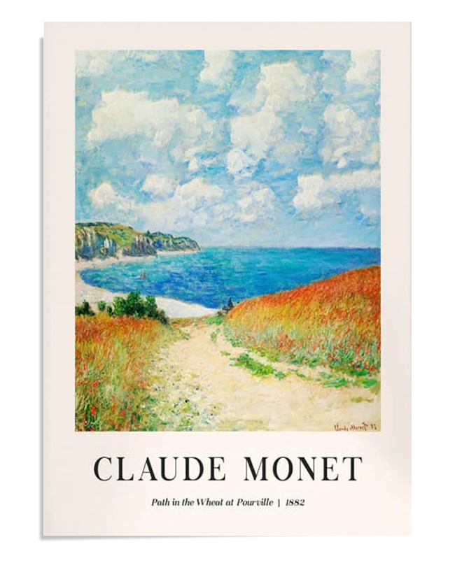 A bright landscape of a wheat field with a path leading to the sea. The cliffs in the distance meet the blue water, and the sky is filled with fluffy white clouds. The golden wheat adds warmth to this coastal scene.