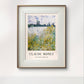 The framed painting of a serene riverside scene brings an air of nature into a modern room, with soft lighting enhancing the calming effect of the yellow and green plants near the water. The room feels both cozy and refined.