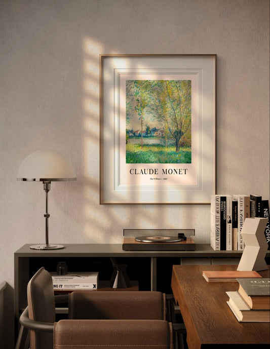 The framed artwork, displayed in a cozy, modern room, captures the essence of nature's beauty with its delicate depiction of willows and a peaceful riverside. The soft lighting enhances the tranquil ambiance of the room.