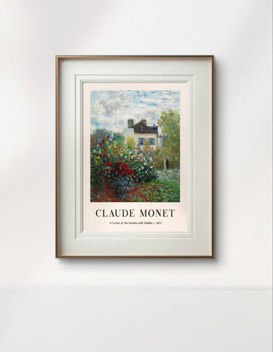 Displayed in a stylish, modern space, the framed painting of Monet's dahlia garden enhances the room's natural light. The vibrant flowers and serene setting blend beautifully with the cozy decor.