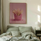 Bedroom with a pink framed artwork above the bed