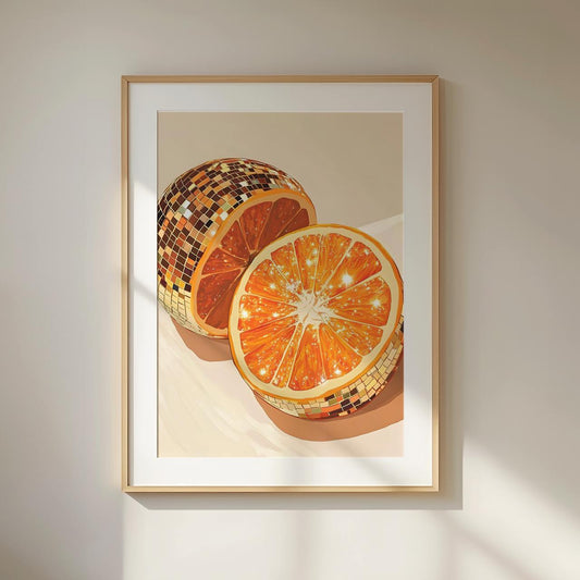 Framed artwork of sliced oranges with mosaic patterns on a beige background