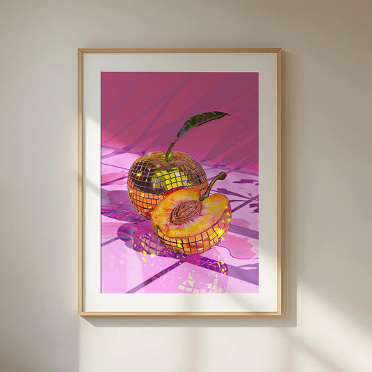 A modern art print featuring a peach turned into a golden disco ball and a half-cut peach with vibrant yellow and orange tones. They sit on a reflective pink tiled surface with shimmering light patterns. The background is bright pink, creating a glamorous and playful atmosphere.