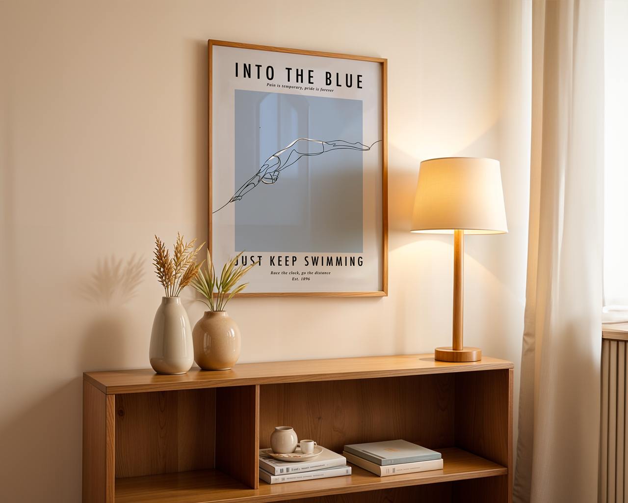 Framed poster on a wall above a wooden shelf with decor items.