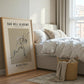 Bedroom with a framed poster of a basketball player and 'Oak Hill Academy' text.