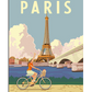 A colorful illustrated poster featuring the Eiffel Tower in the background with a bright blue sky and fluffy clouds. In the foreground, a woman wearing an orange top rides a bicycle along a path, pointing toward the sky. A scenic bridge crosses over a river, adding to the Parisian charm. The word "PARIS" is displayed in bold letters at the top.

